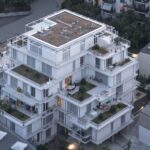 15 Heap Apartments inside of an Urban Island. Landskronhof in Basel, Switzerland